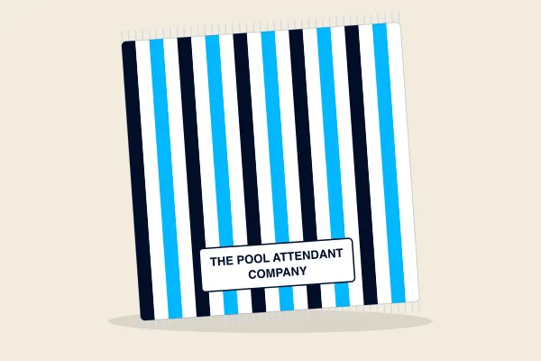 Navy, white and sky-blue striped beach towel with The Pool Attendant Company label
